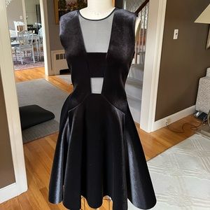 DKNY black velvet fit and flair with cut outs